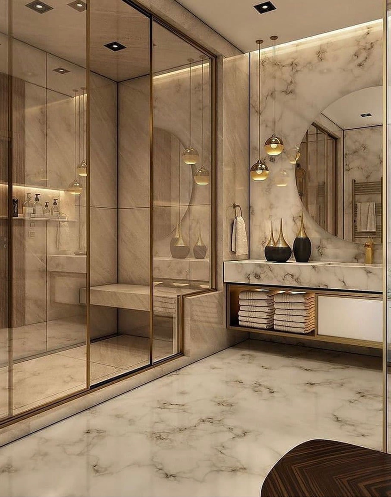 Marble and brass en-suite with walk-in steam shower and floating vanity